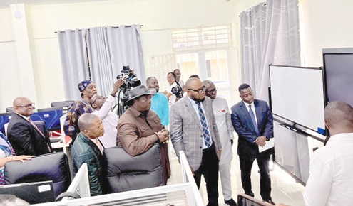 Prof. Emmanuel Ohene Afoakwa (in hat), Vice-Chancellor of the university, and Mohammed Adams Sukparu (arrowed), Deputy Minister of Communication, Digital Technology and Innovations, with some officials touring the new facility after it was commissioned Prof. Emmanuel Ohene Afoakwa (in hat), Vice-Chancellor of the university, and Mohammed Adams Sukparu (arrowed), Deputy Minister of Communication, Digital Technology and Innovations, with some officials touring the new facility after it was commissioned