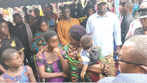  The Vice-President, Professor Naana Jane Opoku-Agyemang, with the six- months-old Xorse Akpatsu and Belinda Ayikpa during the visit to commiserate with the victims