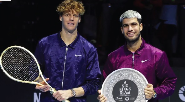• Jannik Sinner (left) displaying the trophy he won during the competition • Jannik Sinner (left) displaying the trophy he won during the competition
