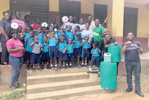 Mavis Maku Addo (left), President of Rotaract Club of Accra Labone, and Iddriss Zuberu (right), President of Rotaract Club of Accra Osu Oxford Street, and other club members with some teachers and pupils after the sensitisation Mavis Maku Addo (left), President of Rotaract Club of Accra Labone, and Iddriss Zuberu (right), President of Rotaract Club of Accra Osu Oxford Street, and other club members with some teachers and pupils after the sensitisation