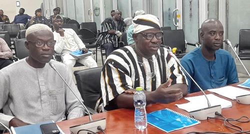 Mr Abaah (middle), the Chief Executive for the Bongo District, responding to questions from the committee members during the hearing Mr Abaah (middle), the Chief Executive for the Bongo District, responding to questions from the committee members during the hearing