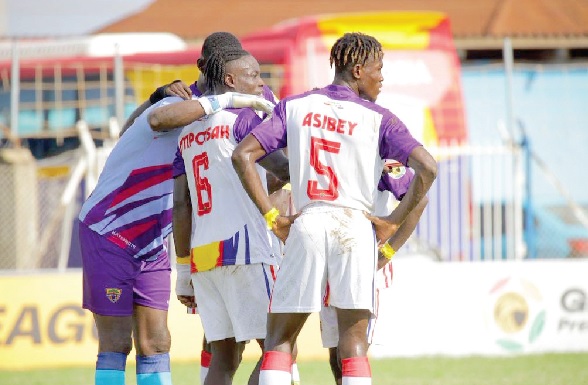 Benjamin Asare (left), Hearts goalkeeper, in discussion with Kelvin Osei Asibey (right) and Raphael Amponsah, his teammates, during their game yesterday Benjamin Asare (left), Hearts goalkeeper, in discussion with Kelvin Osei Asibey (right) and Raphael Amponsah, his teammates, during their game yesterday
