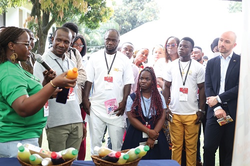 Juliana Dovi (left), CEO, Nature Squeezed, explaining the contents of her product to Khalid Iddrisu (2nd from left), Country Team leader, 2Scale, as other guests look on during a visit to the exhibition stands. Picture: BENEDICT OBUOBI Juliana Dovi (left), CEO, Nature Squeezed, explaining the contents of her product to Khalid Iddrisu (2nd from left), Country Team leader, 2Scale, as other guests look on during a visit to the exhibition stands. Picture: BENEDICT OBUOBI