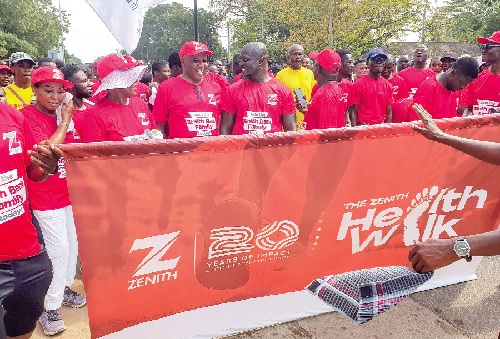 Henry Chinedu Onwuzurigbo (3rd from left), Managing Director, Zenith Bank, and Stephen Appiah (4th from left), former captain, Black Stars, in an interaction during the health walk. Picture: ERNEST KODZI Henry Chinedu Onwuzurigbo (3rd from left), Managing Director, Zenith Bank, and Stephen Appiah (4th from left), former captain, Black Stars, in an interaction during the health walk. Picture: ERNEST KODZI