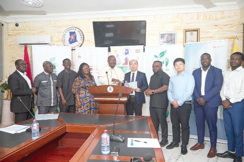 Bishop Gabriel Edoe Kumordji SVD (in cassock), Board Chairman of Lumen Energy Company Ltd, exchanging the MoU with Bob Wang, Director, Digital Power Business Department, Huawei Ghana Bishop Gabriel Edoe Kumordji SVD (in cassock), Board Chairman of Lumen Energy Company Ltd, exchanging the MoU with Bob Wang, Director, Digital Power Business Department, Huawei Ghana