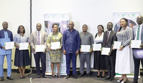 Ebenezer Nortey (6th from right), Chief Economic Officer and Head of the European Union, Europe and Americas Unit, Ministry of Finance, with the participants during the ceremony  Picture: EDNA SALVO KOTEY 