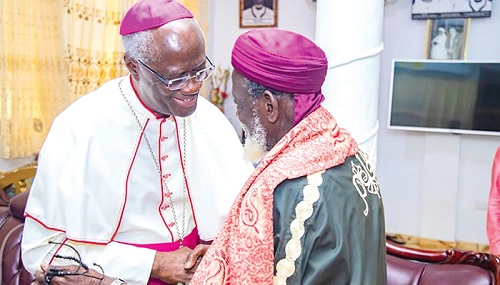 Most Rev. John Bonanventure Kwofie (left), Metropolitan Archbishop of Accra, with Sheikh Usmanu Nuhu Sharubutu, the National Chief Imam