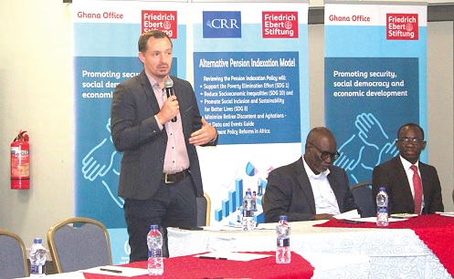 Martin Guettler, Country Representative, Friedrich Ebert Stiftung, addressing the stakeholders at the event. Looking on are Dr Frank Odoom (2nd from right), Advisory Board Chair, Africa Centre for Retirement Research, and Abdallah Mashud (right), research team lead, Africa Centre for Retirement Research. Picture: ERNEST KODZI  Martin Guettler, Country Representative, Friedrich Ebert Stiftung, addressing the stakeholders at the event. Looking on are Dr Frank Odoom (2nd from right), Advisory Board Chair, Africa Centre for Retirement Research, and Abdallah Mashud (right), research team lead, Africa Centre for Retirement Research. Picture: ERNEST KODZI