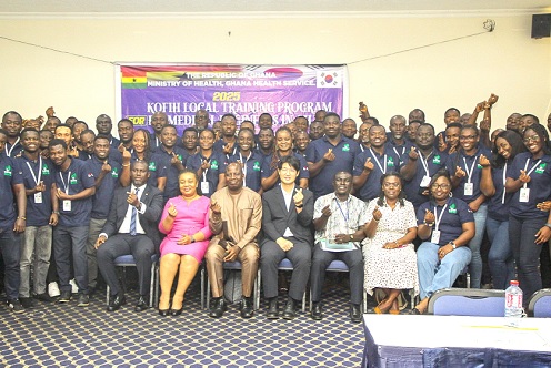 Bomin Yang (seated middle), Dr Nicholas Adjabu (3rd from left), Dr Maureen Martey (2nd from left) and other officials with the biomedical engineers after the event. Picture: CALEB VANDERPUYE