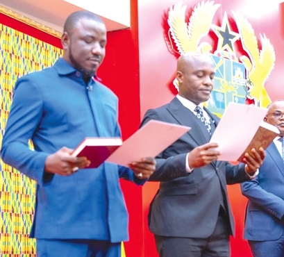 Prof. Alidu Seidu (left) and Bernard Bediako Baidoo taking the oath of office