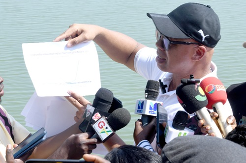 The current state of the intake points of the Kpeve Water Treatment Plant. INSET: Adam Mutawakilu, Managing Director, Ghana Water Company, explaining a point to journalists during a tour of the facility. Picture: SAMUEL TEI ADANO  