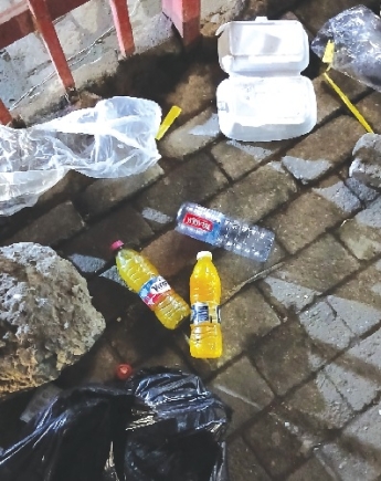 It is common to find urine in plastic water bottles on pavements at night It is common to find urine in plastic water bottles on pavements at night