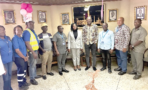 Henry Kwadwo Boateng (3rd from right), Institution of Engineering and Technology, Ghana, with Edmond Kombat (4th from right), Managing Director of TOR, other staff of the refinery and members of the institution