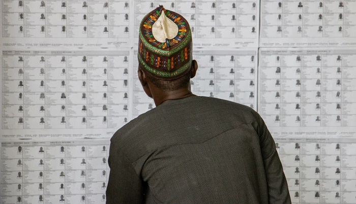 A voter checks his name on the voters' list before casting his ballot at a polling station in Garoua, Cameroon, on 12 October. AP - Welba Yamo Pascal A voter checks his name on the voters' list before casting his ballot at a polling station in Garoua, Cameroon, on 12 October. AP - Welba Yamo Pascal