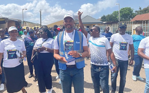 Mohammed Muntaka, the Ashanti Regional Director, NHIS, leading the sensitisation walk in Kumasi