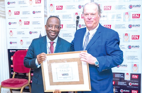 Alex Apau Dadey (left), Executive Chairman of KGL Group, receiving a citation from Mark A. Furlong of Forbes Alex Apau Dadey (left), Executive Chairman of KGL Group, receiving a citation from Mark A. Furlong of Forbes
