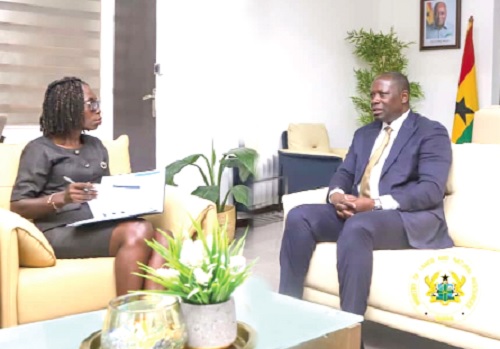 Emmanuel Armah Kofi-Buah, Minister of Lands and Natural Resources and MP for Ellembelle, explaining a point to Daily Graphic’s Rosalind K. Amoh  during the interview