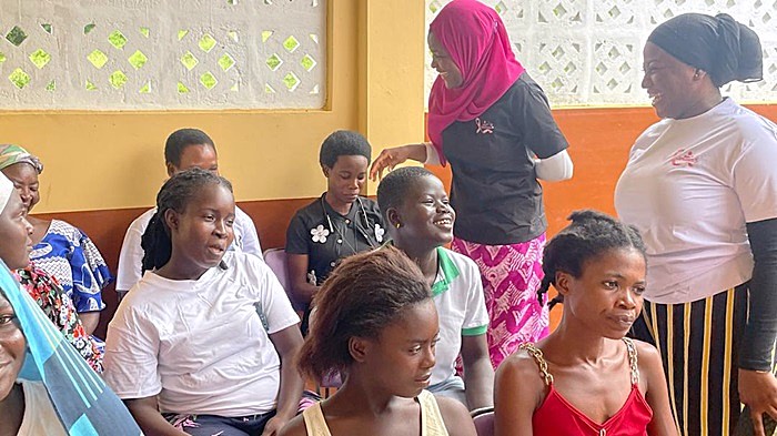 Founder of the Muslimah Mentorship Network, Ms Bilkis Nuhu Kokroko, interacting with some women and girls during the breast cancer screening and mentorship outreach at Paakro in the Eastern Region.
