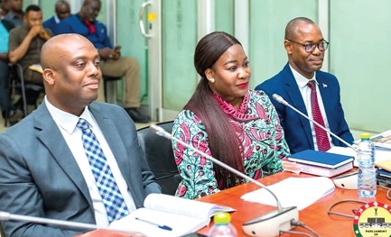 Justina Nelson (middle), CEO, Minerals Income Investment Fund (MIIF), with Thomas Nyarko Ampem (left), Deputy Finance Minister, and David Awuah Mensah, Chief Finance Officer, MIIF, before the committee  Justina Nelson (middle), CEO, Minerals Income Investment Fund (MIIF), with Thomas Nyarko Ampem (left), Deputy Finance Minister, and David Awuah Mensah, Chief Finance Officer, MIIF, before the committee
