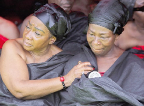 Akosua Serwa (right), wife of Daddy Lumba, being consoled. Picture: CALEB VANDERPUYE