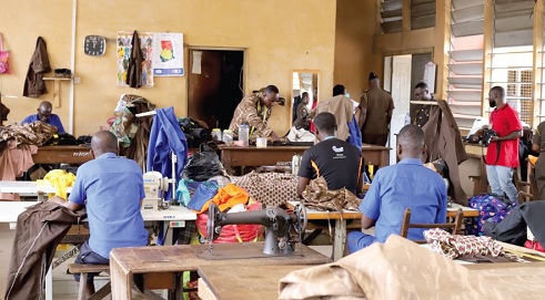 Some inmates at the tailoring shop