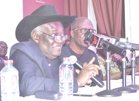 Prof. Kwamena Ahwoi (left), Local Government expert and politician, delivering the S.N. Woode Memorial Lecture