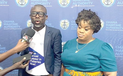Awudu Enusah (left), Chairman of the National Tripartite Work in Fishing Committee, speaking to the press