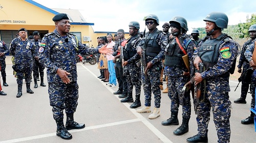 IGP Christian Tetteh Yohuno (left) addressing the Special Operations Team in Damongo