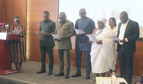Prof. Akua Opokua Britwum (left), Chairperson, National Media Commission, swearing in the newly elected executive committee members. Picture: ERNEST KODZI 