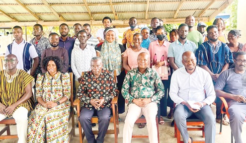 Emmanuel Kwasi Drah (seated 3rd from right), the MP for Upper West Akim, with other dignitaries and beneficiaries of Drah Education Trust Fund Emmanuel Kwasi Drah (seated 3rd from right), the MP for Upper West Akim, with other dignitaries and beneficiaries of Drah Education Trust Fund