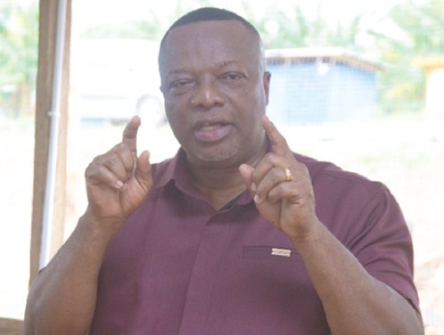 Enoch Kofi Boadu, the CEO of DAS Biogas and Construction Limited, explaining how one of the machines works