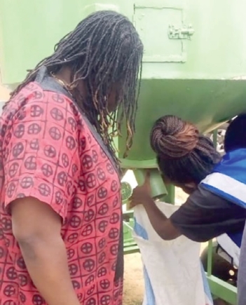 Victoria Amefadzi Yawa Doe, the DCE for North Tongu, observing the machines Victoria Amefadzi Yawa Doe, the DCE for North Tongu, observing the machines