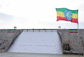   An Ethiopian flag flutters in the wind next to the Grand Ethiopian Renaissance Dam (GERD), built along the Blue Nile, during its inauguration, in Guba, Benishangul-Gumuz region, Ethiopia, September 9, 2025