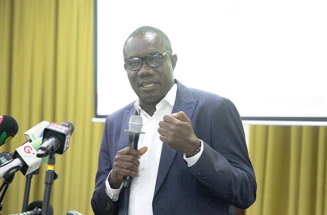 Moses Okley (right), Finance Manager of ECG, addressing the audience at the event. Picture: CALEB VANDERPUYE Moses Okley (right), Finance Manager of ECG, addressing the audience at the event. Picture: CALEB VANDERPUYE