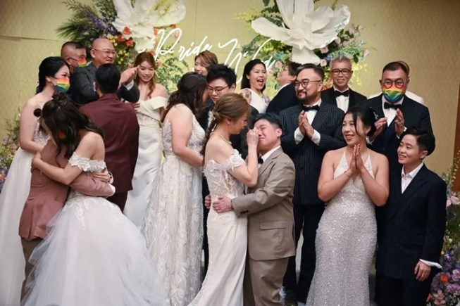 Same-sex couples at a mass wedding ceremony in Hong Kong last year. The ceremony was performed by a pastor online from the United States, as same-sex partnerships are not recognized in Hong Kong.Credit...Peter Parks/Agence France-Presse — Getty Images Same-sex couples at a mass wedding ceremony in Hong Kong last year. The ceremony was performed by a pastor online from the United States, as same-sex partnerships are not recognized in Hong Kong.Credit...Peter Parks/Agence France-Presse — Getty Images