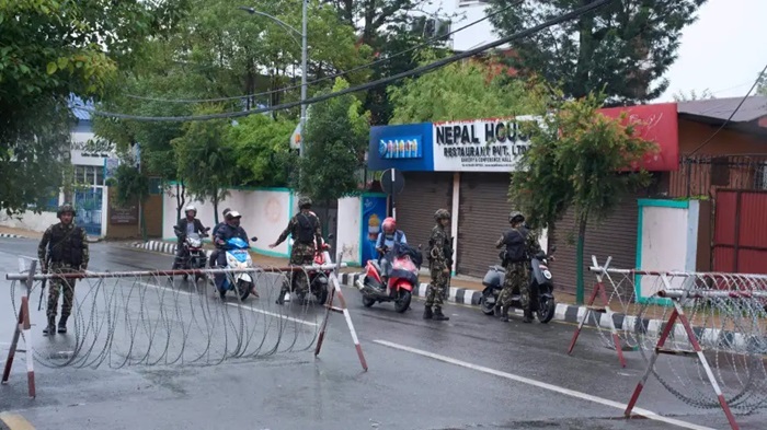 Nepalese army personnel check and question civilians at a checkpoint in Kathmandu, Nepal, Wednesday, Sept. 10, 2025. (AP Photo/Niranjan Shrestha) Nepalese army personnel check and question civilians at a checkpoint in Kathmandu, Nepal, Wednesday, Sept. 10, 2025. (AP Photo/Niranjan Shrestha)