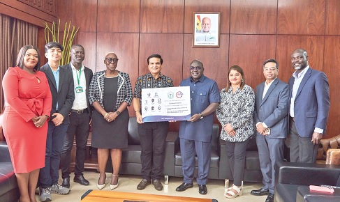 Mukesh Thakwani (5th from left), Chief Executive Officer, B5 Plus Limited, presenting the scholarship prototype to Julius Debrah (4th from right), Chief of Staff. With them are Marietta Brew (4th from left), Presidential Advisor on Legal Affairs, and some staff members of B5 Plus and DPS School Mukesh Thakwani (5th from left), Chief Executive Officer, B5 Plus Limited, presenting the scholarship prototype to Julius Debrah (4th from right), Chief of Staff. With them are Marietta Brew (4th from left), Presidential Advisor on Legal Affairs, and some staff members of B5 Plus and DPS School
