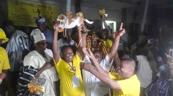 •Philip Atinga, Frafra General Captain, raising the 'puppy trophy' as he celebrates with his teammates after dominating the 2025 Friendship Fun Games •Philip Atinga, Frafra General Captain, raising the 'puppy trophy' as he celebrates with his teammates after dominating the 2025 Friendship Fun Games