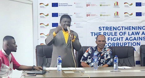 Godfred Owusu, the Fanteakwa North District Director of CHRAJ, delivering a speech at the programme Godfred Owusu, the Fanteakwa North District Director of CHRAJ, delivering a speech at the programme