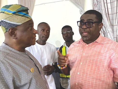 Abu Takoro (left), MCE for Tamale, interacting with Martin Ahorlu (right), Waste Management Director at TaMA, during the launch Abu Takoro (left), MCE for Tamale, interacting with Martin Ahorlu (right), Waste Management Director at TaMA, during the launch