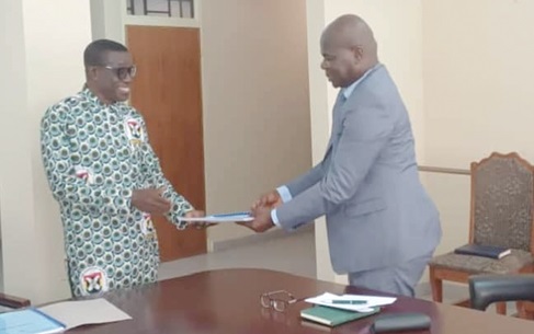 Prof. Daniels Obeng-Ofori (left), Outgoing Vice-Chancellor, CUG, presenting handing over note to Prof. Matthew Glover Addo, newly appointed Vice-Chancellor of the university