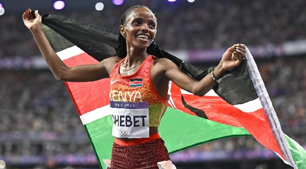 Beatrice Chebet of Kenya celebrates after the women's 10,000m final at the 2025 World Athletics Championships in Tokyo, Japan, on Sept. 13, 2025