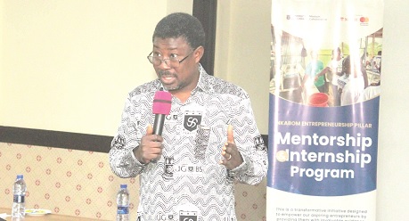 Prof. Justice Bawole (left), immediate past Dean, UGBS, delivering the keynote address. Picture: ERNEST KODZI 