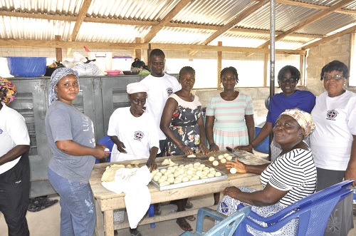 Some beneficiaries of the Dorcas Widows Project preparing pastries
