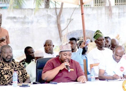 Haruna Mohammed Awal (middle), MCE for Ayawaso North, addressing the meeting