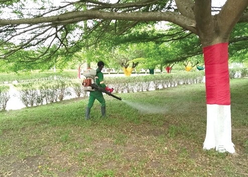 A sprayer disinfesting the Eastern Regional residency in Koforidua