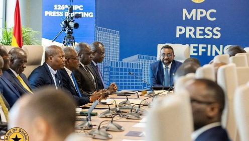Dr Johnson Pandit Asiama (right), Governor, Bank of Ghana, addressing  participants in the media briefing
