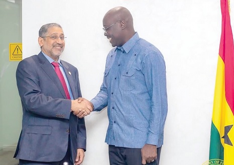  Dr Cassiel Ato Forson (right), Finance Minister, welcoming Abdullah Almusaibeeh to his office