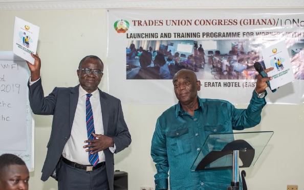Mr Joshua Ansah (right), General Secretary of TUC and Mr Joseph Amuah of the Ghana Employers Association launching the report last Wednesday