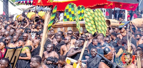 Pallbearers being accompanied by other mourners to the late Asantehemaa’s final resting place. Picture EMMANUEL BAAH